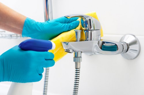Cleaner handling carpet cleaning chemicals with care